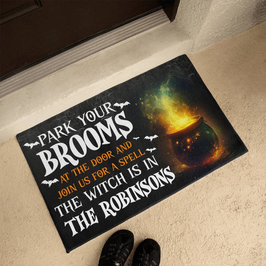 custom halloween welcome mat with family name cauldron and bats